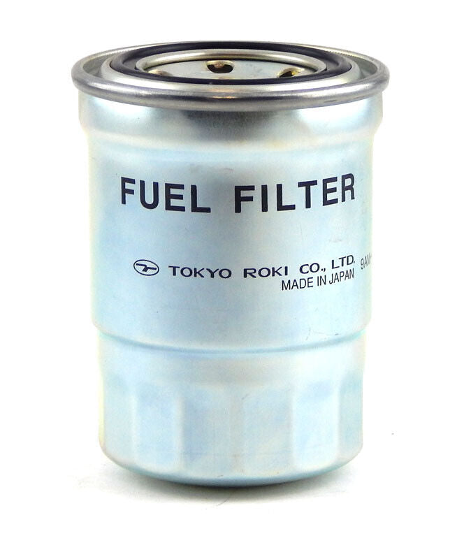 Yanmar 129574-55711 spin-on fuel filter, silver canister marked Fuel Filter, Tokyo Roki, Made in Japan